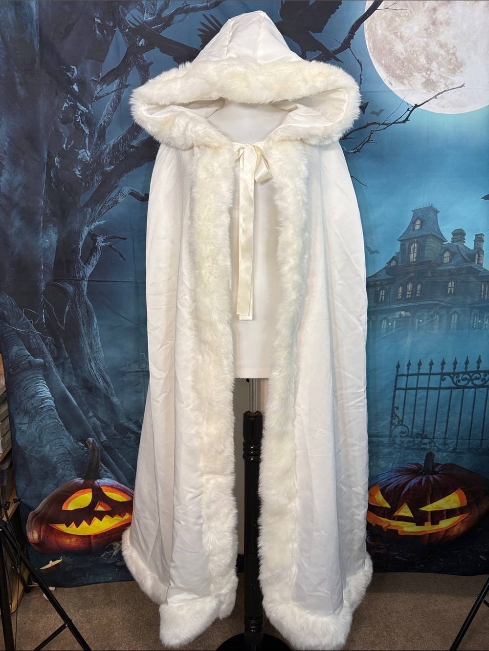 Ivory Fully-Lined Hooded Faux Fur-Trim Cape with Satin Tie, Hat, and Muff